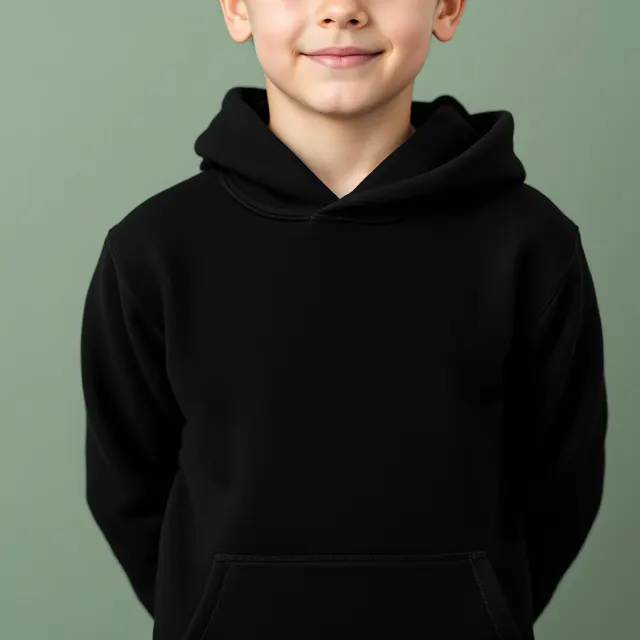 Preview: Black kids' hoodie on a boy, sage studio, close-up: blank hoodie mockup