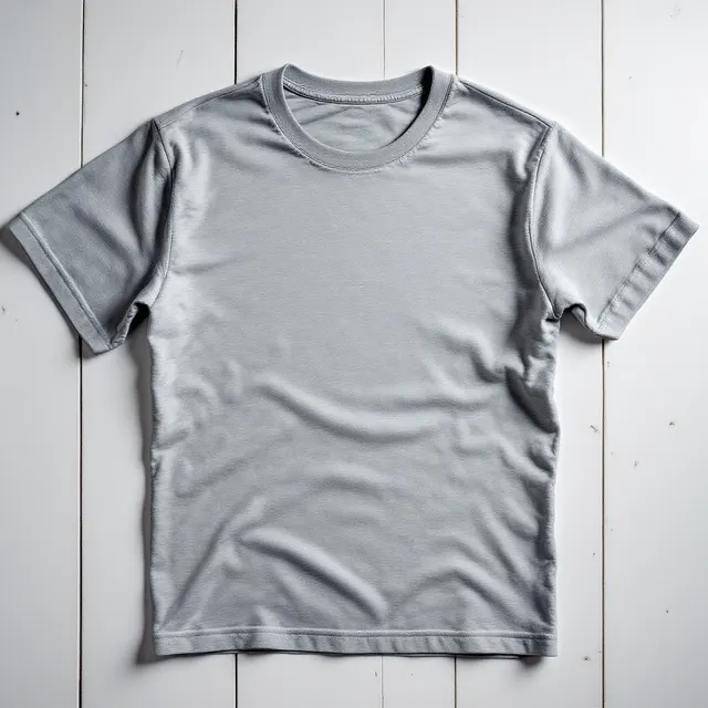 Heather grey tee flat lay, white wood: blank heather grey t-shirt mockup