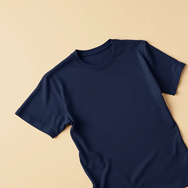 Navy tee flat lay, angled: blank navy t-shirt mockup